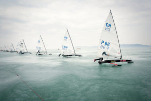 Ice sailing European Championship on Lake Balaton in Hungary, The participants of the regatta push their boats after the starting signal to jump up and then go sailing. The start is in the middle of the ice about 5 km from the country. Ice sailing European Championship on Lake Balaton in Hungary, The participants of the regatta push their boats after the starting signal to jump up and then go sailing. The start is in the middle of the ice about 5 km from the country.